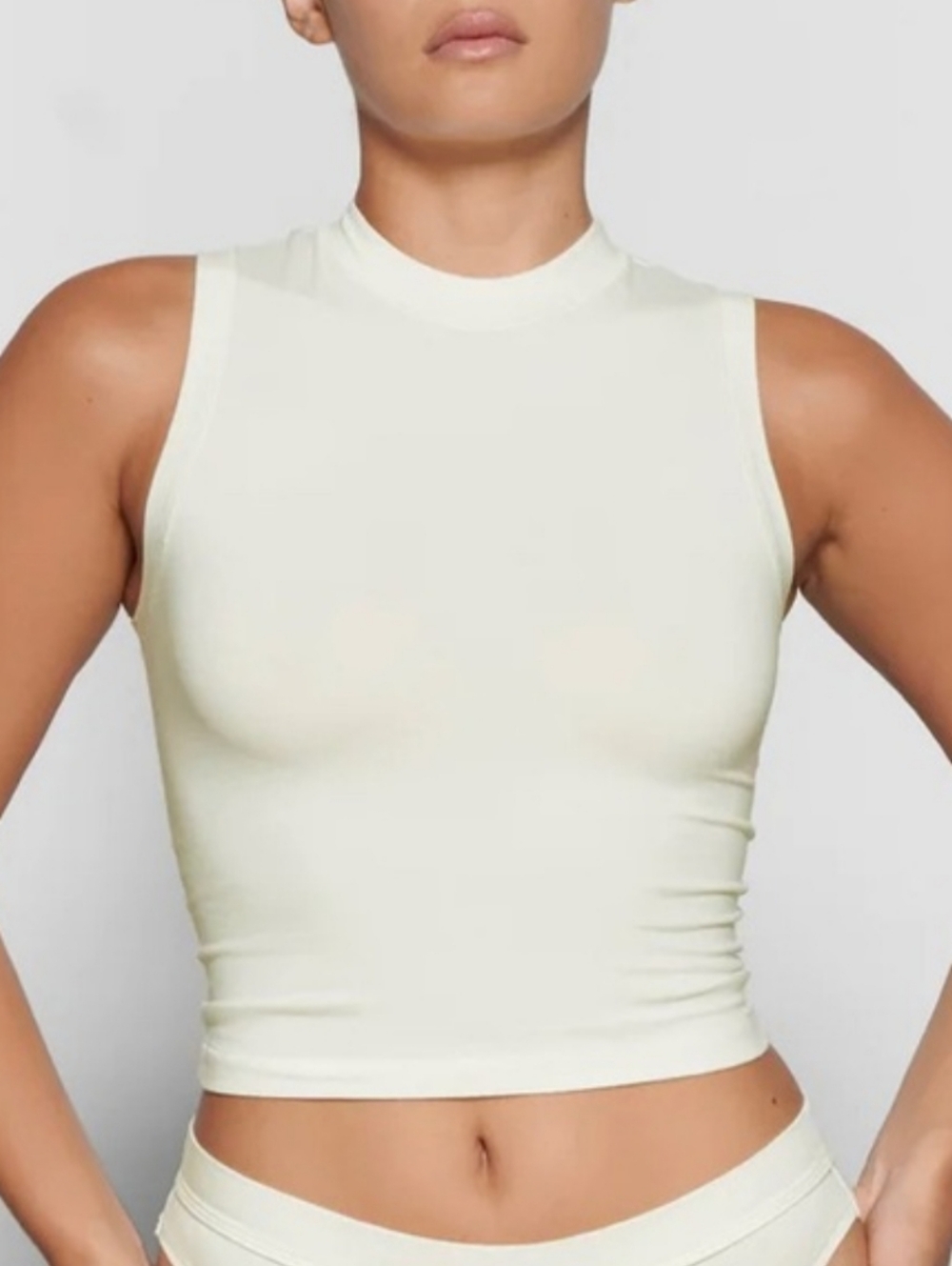 73. BNWT Skims Mock Neck Stretch Tee